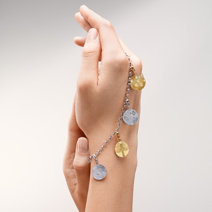 Charm bracelet with 4 pendants