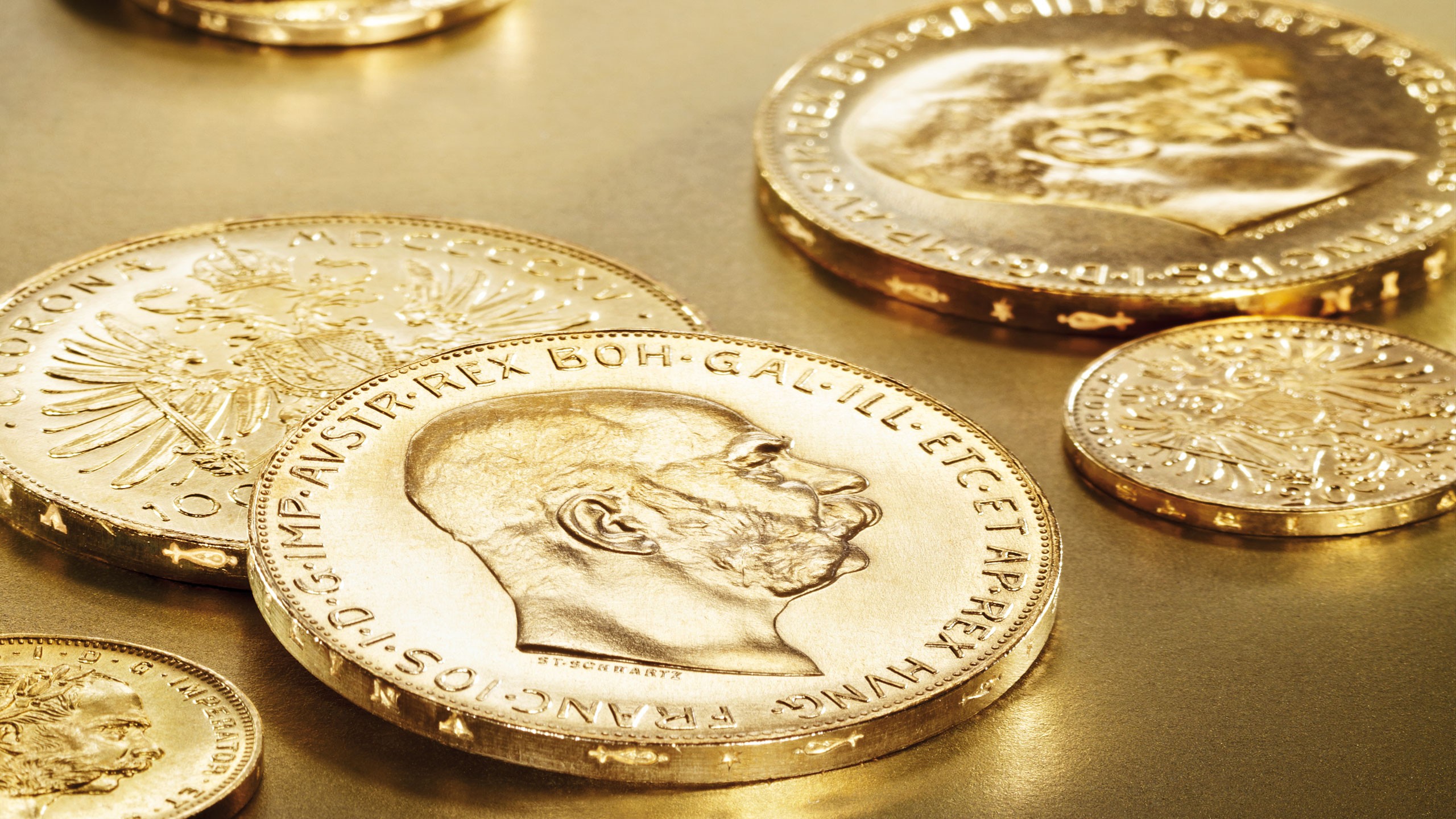 various bullion coins in gold